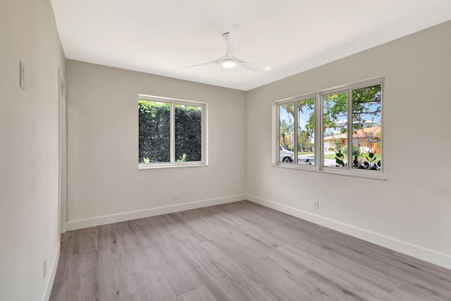 2410 SW 1st St, Boynton Beach, FL 33435 - unfurnished room with ceiling fan, light wood-style flooring, and baseboards