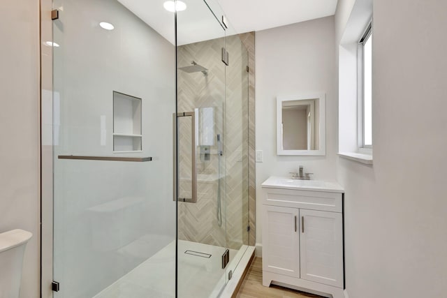 2410 SW 1st St, Boynton Beach, FL 33435 - full bath featuring a stall shower, vanity, and toilet