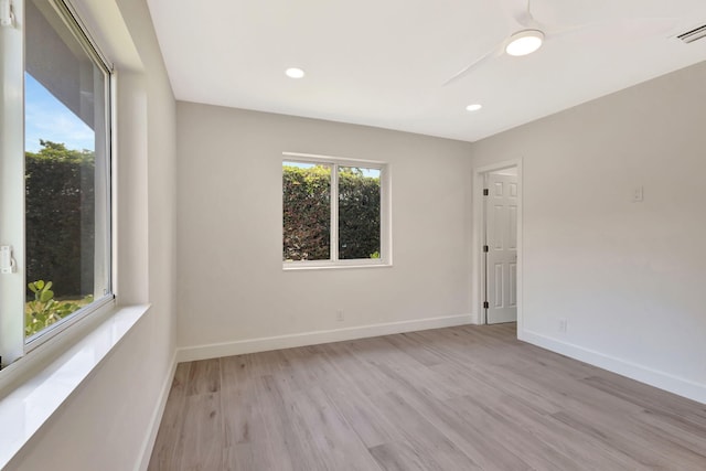 2410 SW 1st St, Boynton Beach, FL 33435 - spare room featuring baseboards, light wood-type flooring, and visible vents