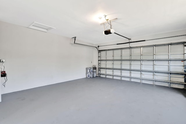 2410 SW 1st St, Boynton Beach, FL 33435 - garage featuring a garage door opener