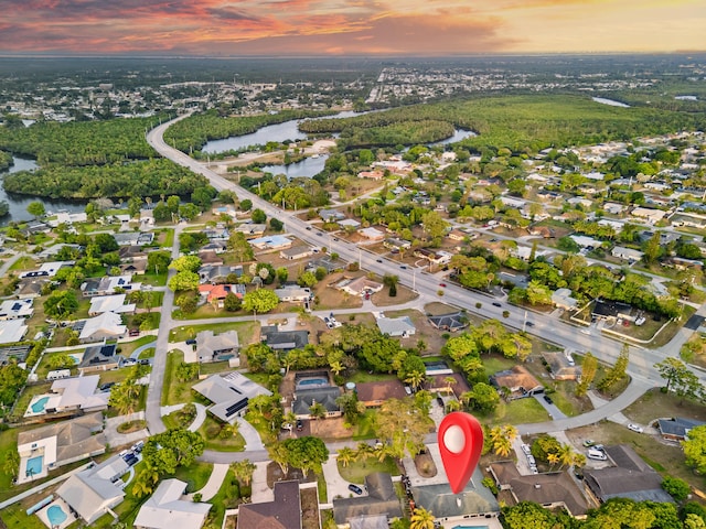 115 NE Caprona Ave, Port Saint Lucie, FL 34983 - bird's eye view featuring a water view and a residential view