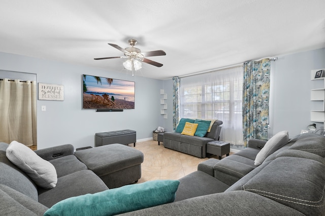 115 NE Caprona Ave, Port Saint Lucie, FL 34983 - living area with baseboards and ceiling fan