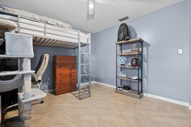 115 NE Caprona Ave, Port Saint Lucie, FL 34983 - bedroom featuring baseboards, ceiling fan, and visible vents