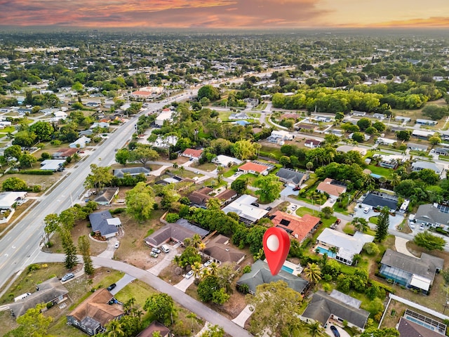 115 NE Caprona Ave, Port Saint Lucie, FL 34983 - birds eye view of property with a residential view