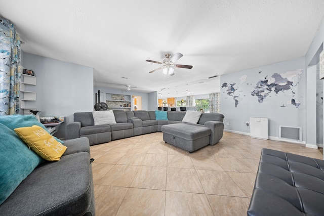 115 NE Caprona Ave, Port Saint Lucie, FL 34983 - tiled living area with visible vents, baseboards, and ceiling fan