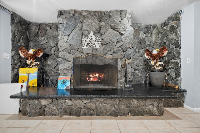 115 NE Caprona Ave, Port Saint Lucie, FL 34983 - details featuring a textured ceiling, baseboards, and a stone fireplace