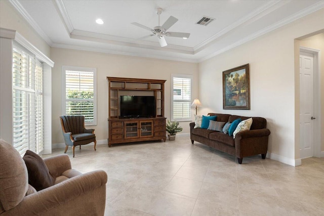 10145 SW Canossa Way, Port Saint Lucie, FL 34986 - living area with a ceiling fan, visible vents, ornamental molding, and a wealth of natural light