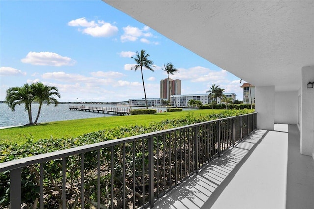 3040 Lake Shore Dr Unit 101, Riviera Beach, FL 33404 - balcony featuring a water view