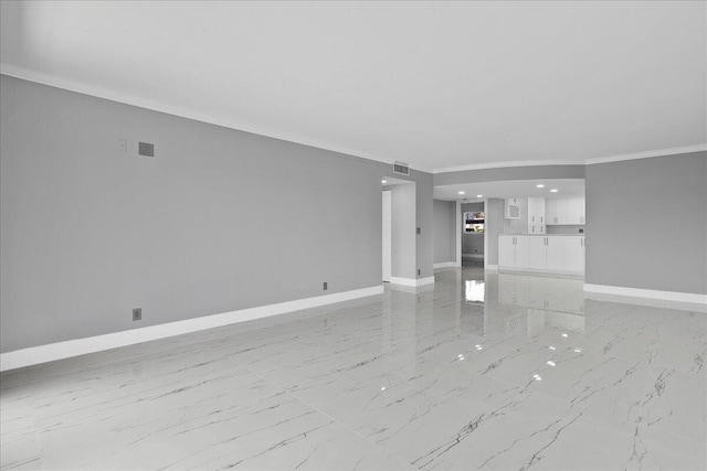 3040 Lake Shore Dr Unit 101, Riviera Beach, FL 33404 - unfurnished living room featuring baseboards, ornamental molding, light marble finish floors, and recessed lighting