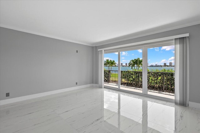 3040 Lake Shore Dr Unit 101, Riviera Beach, FL 33404 - unfurnished room featuring light marble finish flooring, baseboards, ornamental molding, and a water view