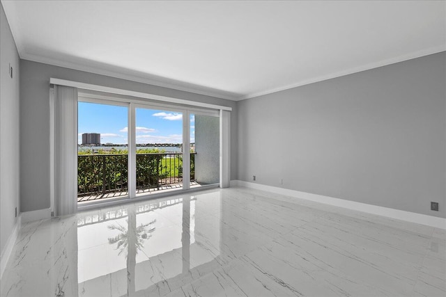 3040 Lake Shore Dr Unit 101, Riviera Beach, FL 33404 - empty room with baseboards, marble finish flooring, and ornamental molding