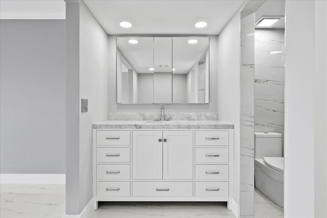 3040 Lake Shore Dr Unit 101, Riviera Beach, FL 33404 - bathroom with marble look tiles, baseboards, recessed lighting, vanity, and toilet