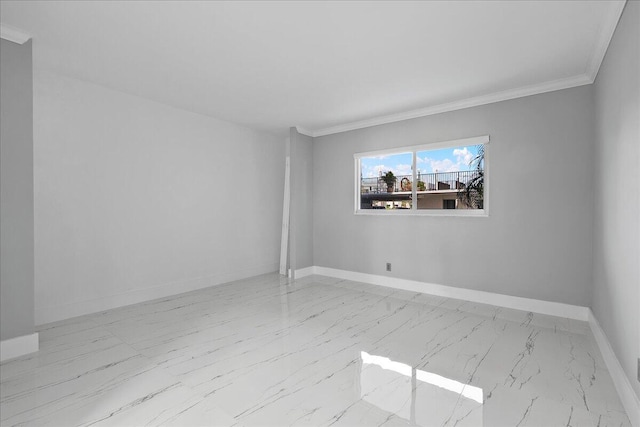 3040 Lake Shore Dr Unit 101, Riviera Beach, FL 33404 - unfurnished room featuring marble look tile flooring, crown molding, and baseboards