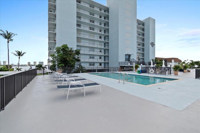 3040 Lake Shore Dr Unit 101, Riviera Beach, FL 33404 - community pool with a patio
