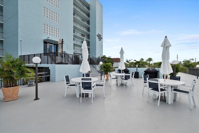 3040 Lake Shore Dr Unit 101, Riviera Beach, FL 33404 - view of patio / terrace featuring outdoor dining area