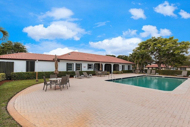 community pool featuring a patio