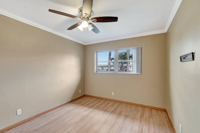 2867 Ashley Dr W Unit G, West Palm Beach, FL 33415 - spare room featuring baseboards, ornamental molding, and light wood finished floors
