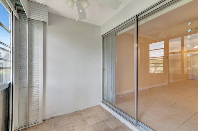 2867 Ashley Dr W Unit G, West Palm Beach, FL 33415 - unfurnished sunroom with tile patterned flooring and ceiling fan