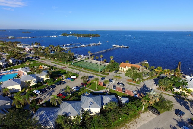 birds eye view of property featuring a residential view and a water view