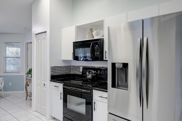 kitchen featuring open shelves, dark stone counters, white cabinetry, light tile patterned floors, and black appliances