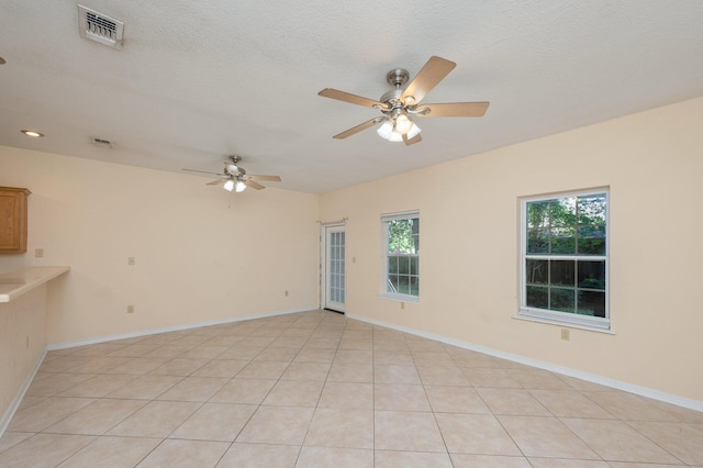 647 Gap Creek Dr, Fort Walton Beach, FL 32548 - unfurnished room with ceiling fan, light tile patterned floors, and baseboards