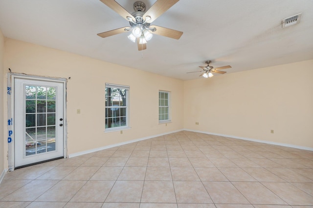 647 Gap Creek Dr, Fort Walton Beach, FL 32548 - empty room featuring a ceiling fan, healthy amount of natural light, and baseboards