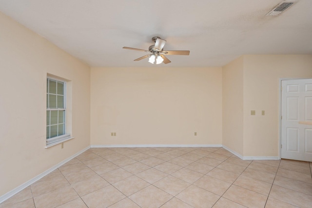 647 Gap Creek Dr, Fort Walton Beach, FL 32548 - spare room featuring a ceiling fan, baseboards, and light tile patterned floors