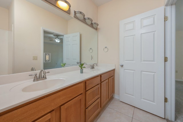 647 Gap Creek Dr, Fort Walton Beach, FL 32548 - full bath with double vanity, tile patterned floors, and a ceiling fan