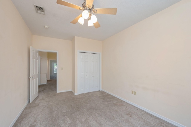 647 Gap Creek Dr, Fort Walton Beach, FL 32548 - unfurnished bedroom with carpet flooring, baseboards, a closet, and ceiling fan