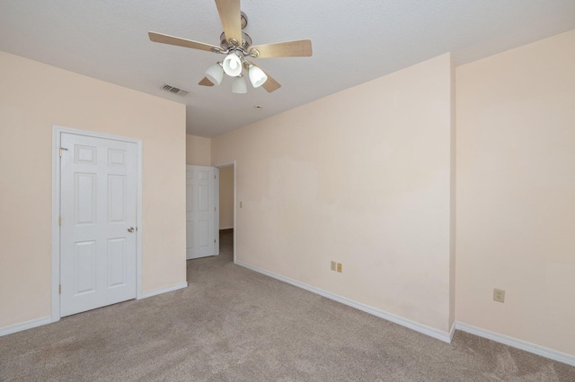 647 Gap Creek Dr, Fort Walton Beach, FL 32548 - unfurnished bedroom featuring light colored carpet, baseboards, and ceiling fan