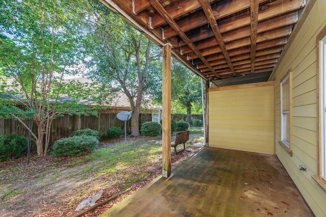 647 Gap Creek Dr, Fort Walton Beach, FL 32548 - view of patio featuring a fenced backyard and a carport