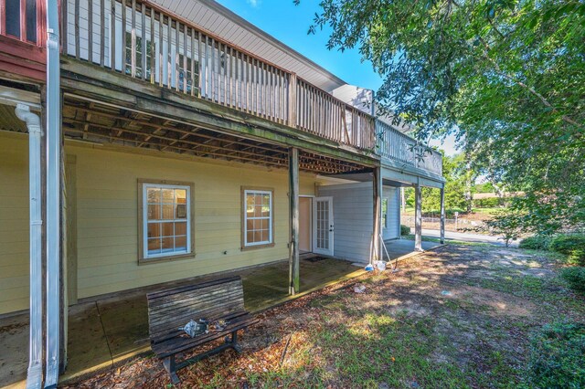 647 Gap Creek Dr, Fort Walton Beach, FL 32548 - back of house with a deck and a patio area
