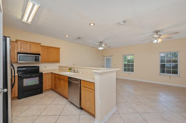 647 Gap Creek Dr, Fort Walton Beach, FL 32548 - kitchen featuring appliances with stainless steel finishes, ceiling fan, open floor plan, a peninsula, and recessed lighting