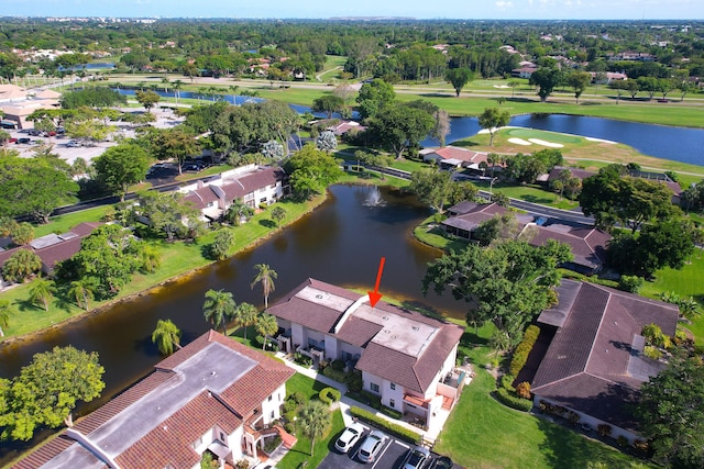 aerial perspective of suburban area with a large body of water