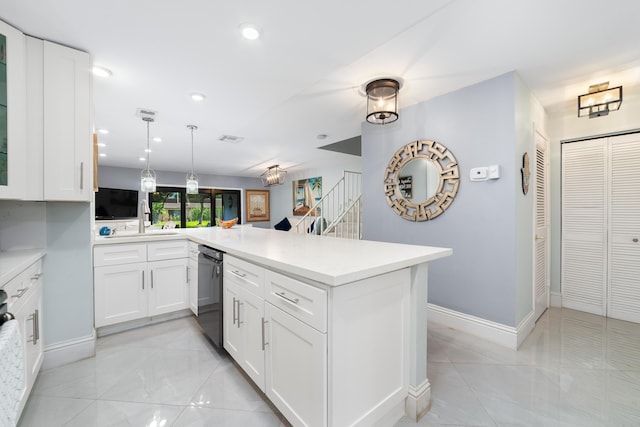 kitchen with black dishwasher, a peninsula, a sink, light countertops, and recessed lighting