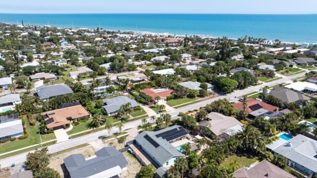 aerial view with a water view and a residential view