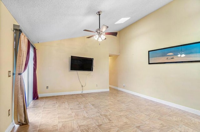 5578 Golden Eagle Cir Unit 5578, Palm Beach Gardens, FL 33418 - unfurnished living room with lofted ceiling, a textured ceiling, baseboards, and a ceiling fan