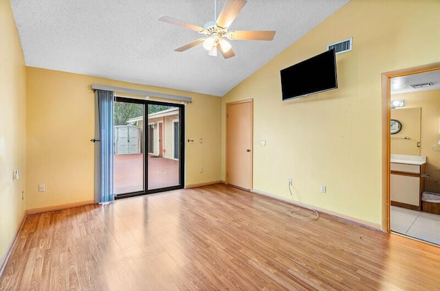 5578 Golden Eagle Cir Unit 5578, Palm Beach Gardens, FL 33418 - unfurnished room with a ceiling fan, light wood-style floors, visible vents, and lofted ceiling