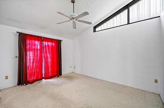 5578 Golden Eagle Cir Unit 5578, Palm Beach Gardens, FL 33418 - empty room with vaulted ceiling, a textured ceiling, carpet, and a ceiling fan