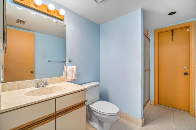 5578 Golden Eagle Cir Unit 5578, Palm Beach Gardens, FL 33418 - bathroom featuring toilet, tile patterned floors, vanity, and a shower stall