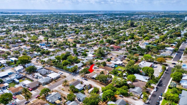 birds eye view of property with a residential view