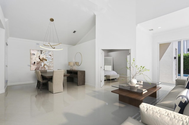 tiled living room featuring crown molding, baseboards, a towering ceiling, and a chandelier