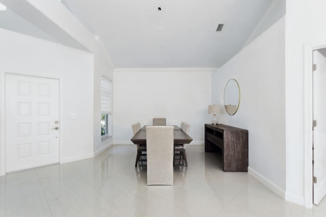 dining area featuring light tile patterned flooring, baseboards, visible vents, and ornamental molding