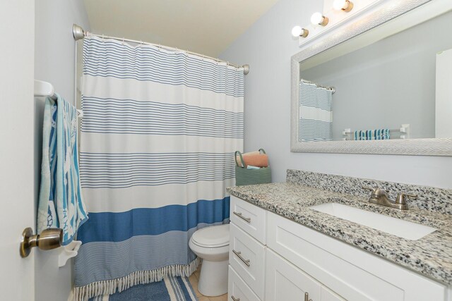 full bath with toilet, a shower with curtain, tile patterned flooring, and vanity