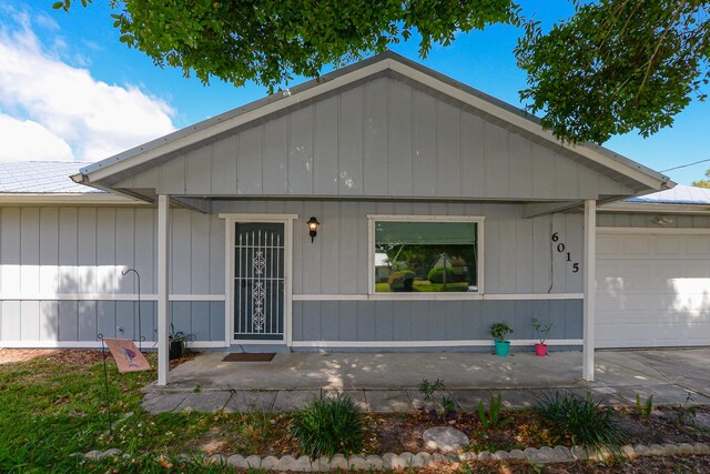 ranch-style home featuring an attached garage