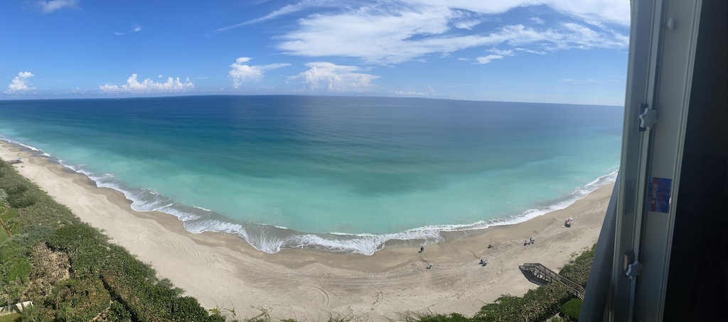 property view of water featuring a view of the beach