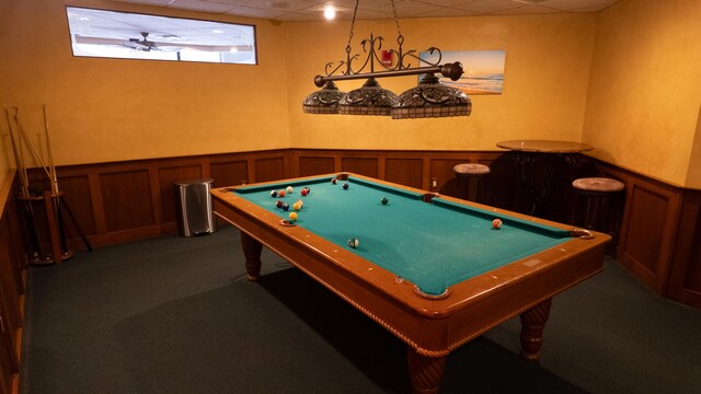 9500 S Ocean Dr Unit 1502, Jensen Beach, FL 34957 - game room featuring carpet floors, billiards table, a wainscoted wall, a drop ceiling, and a decorative wall