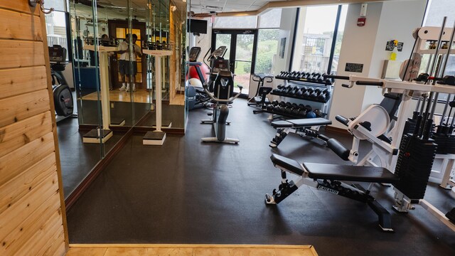9500 S Ocean Dr Unit 1502, Jensen Beach, FL 34957 - gym featuring floor to ceiling windows