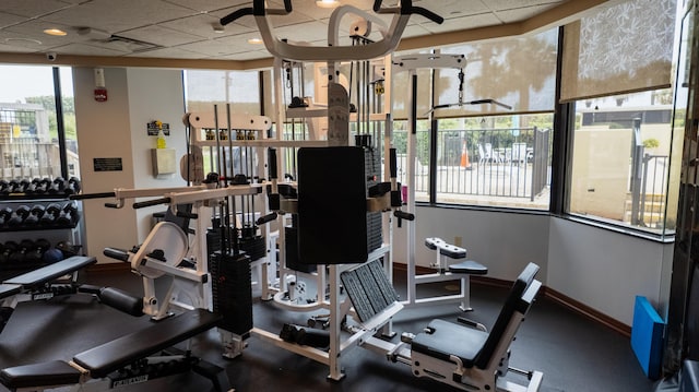 9500 S Ocean Dr Unit 1502, Jensen Beach, FL 34957 - workout area featuring a drop ceiling and baseboards
