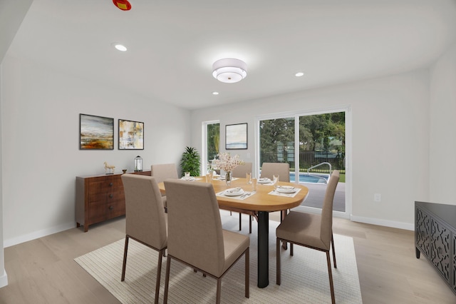 4372 SW Bimini Cir N, Palm City, FL 34990 - dining space featuring light wood-type flooring, recessed lighting, and baseboards